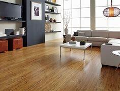 Redisigned living space featuring new hardwood flooring