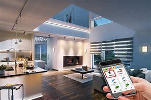 person holding smart phone controler for smart home features