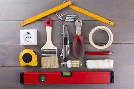 A varity of DIY tools arranged in the shape of a house