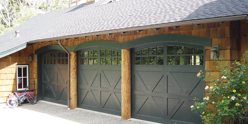 Three car garage with focus on doors