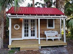 Tiny house with red roof