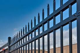 Wrought Iron Fence against blue sky