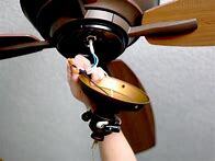 Cieling fan installation using one hand