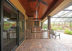 Outdoor kitchen on brick patio