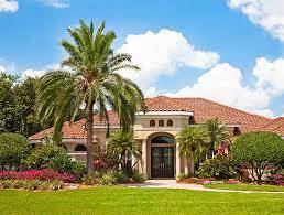 Sunny Florida home with landscaped front yard