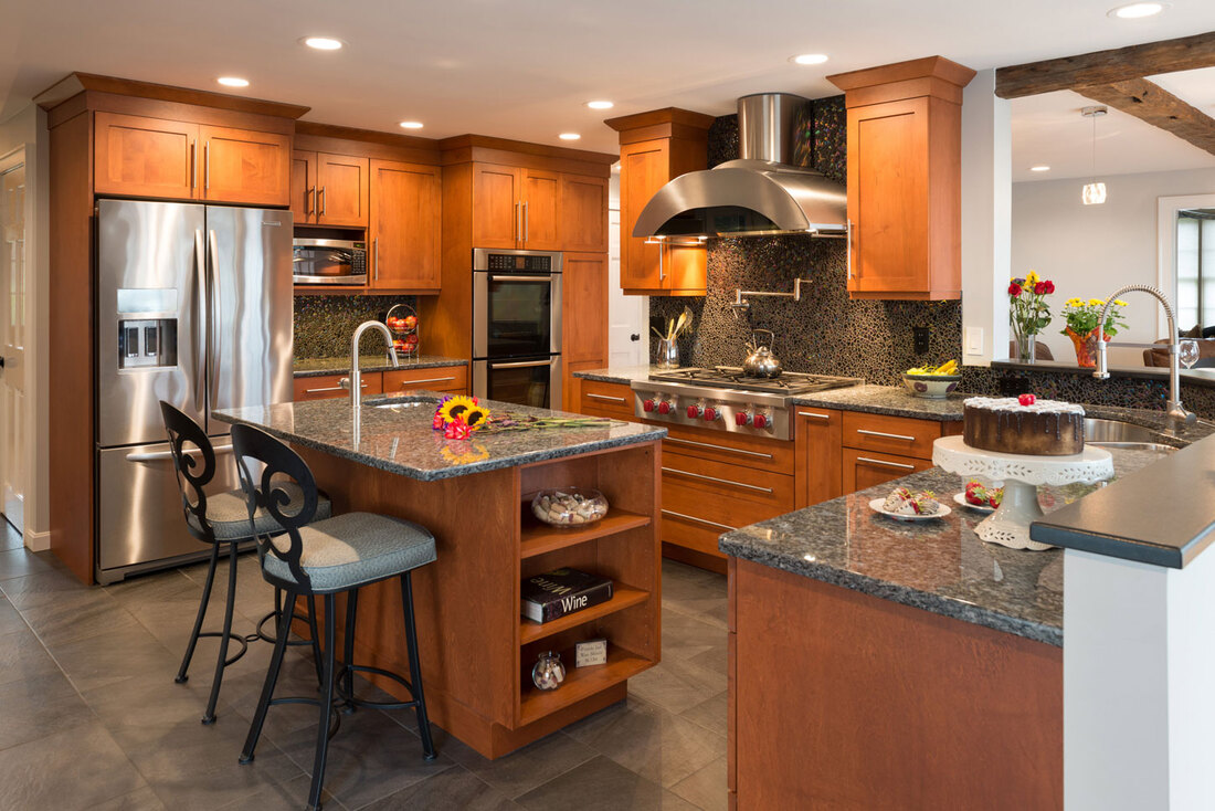 Kitchem makeover with dark wood cabinets, granit countertops and SS refrigerator