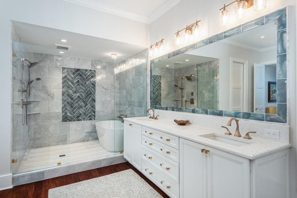 Beautiful bathroom upgrade featuring marble shower and granite vanity top